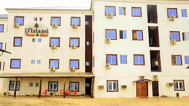 A multi-story building with a sign reading "D'Island Hotel & Club". - D'ISLAND hotel (Lekki)