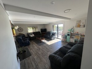 Smart TV, fireplace, table tennis, books