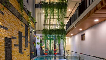 Indoor pool, outdoor pool, open 5:00 AM to 9:00 PM, pool umbrellas