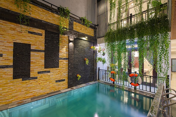 Indoor pool, outdoor pool, open 5:00 AM to 9:00 PM, pool umbrellas