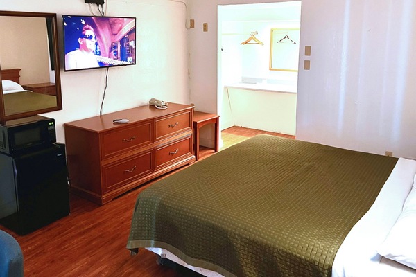 Room, 1 King Bed, Smoking, Refrigerator & Microwave | Desk, WiFi (free), individually decorated, individually furnished