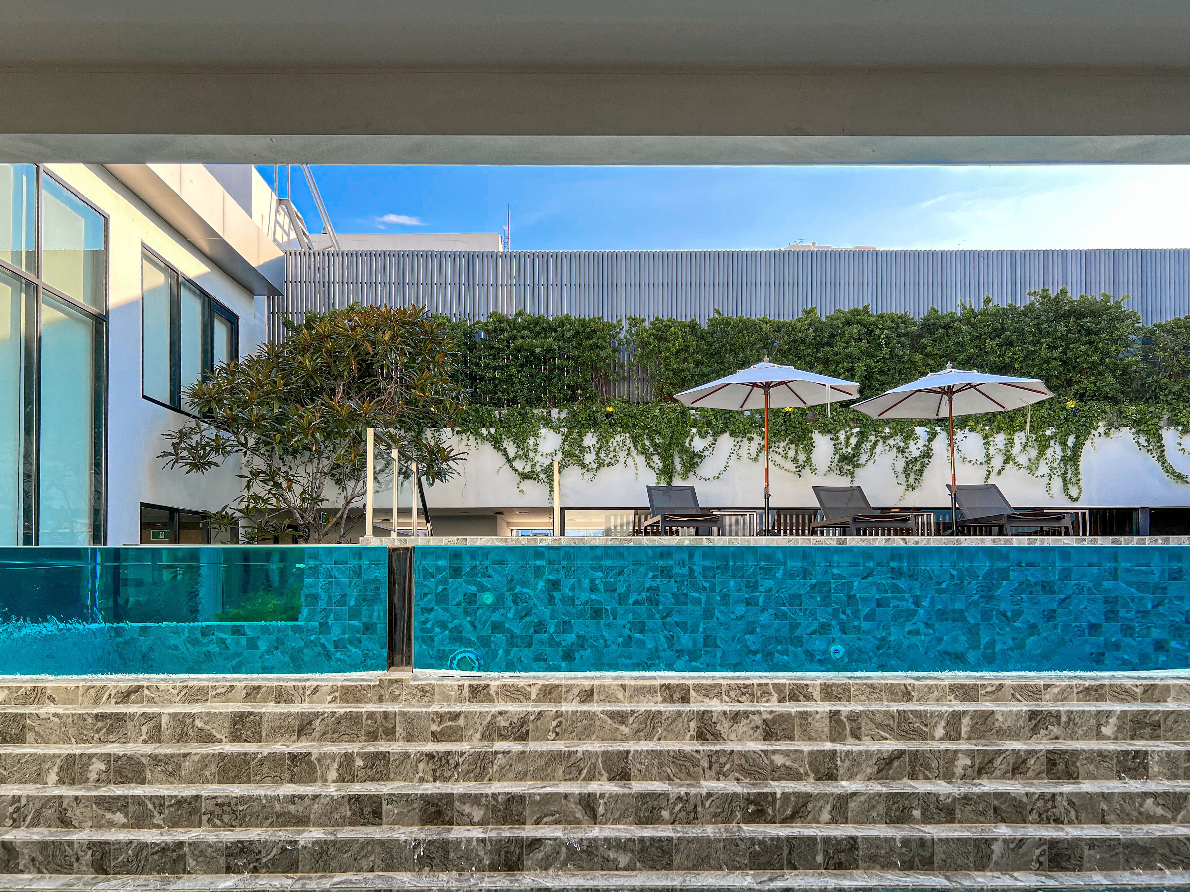 Outdoor pool, pool umbrellas, pool loungers