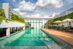 Outdoor pool, pool umbrellas, pool loungers