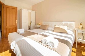 4 bedrooms, iron/ironing board, travel cot, WiFi