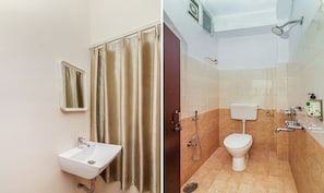 Quarto standard | Banheiro | Chuveiro, produtos de toalete de grife, toalhas de banho