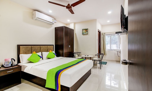 Quarto standard | Ferros/tábuas de passar roupa, Wi-Fi de cortesia, roupa de cama