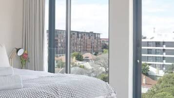 Apartamento, 2 quartos | 2 quartos, berços grátis, Wi-Fi de cortesia, roupa de cama