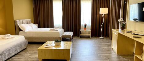 Family Room | Premium bedding, memory foam beds, minibar, in-room safe