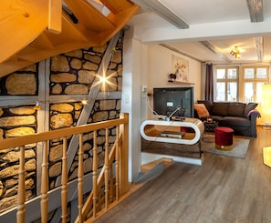 Apartment, 1 Bedroom, Terrace | Living area | Flat-screen TV, fireplace, toys - Apartment unter dem Schloss (Quedlinburg)