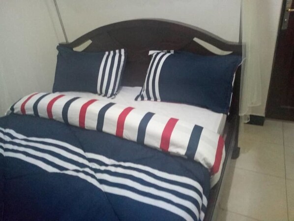 Deluxe Double Room | Individually decorated, desk, laptop workspace, bed sheets - La Maison Hotel (Kotido)