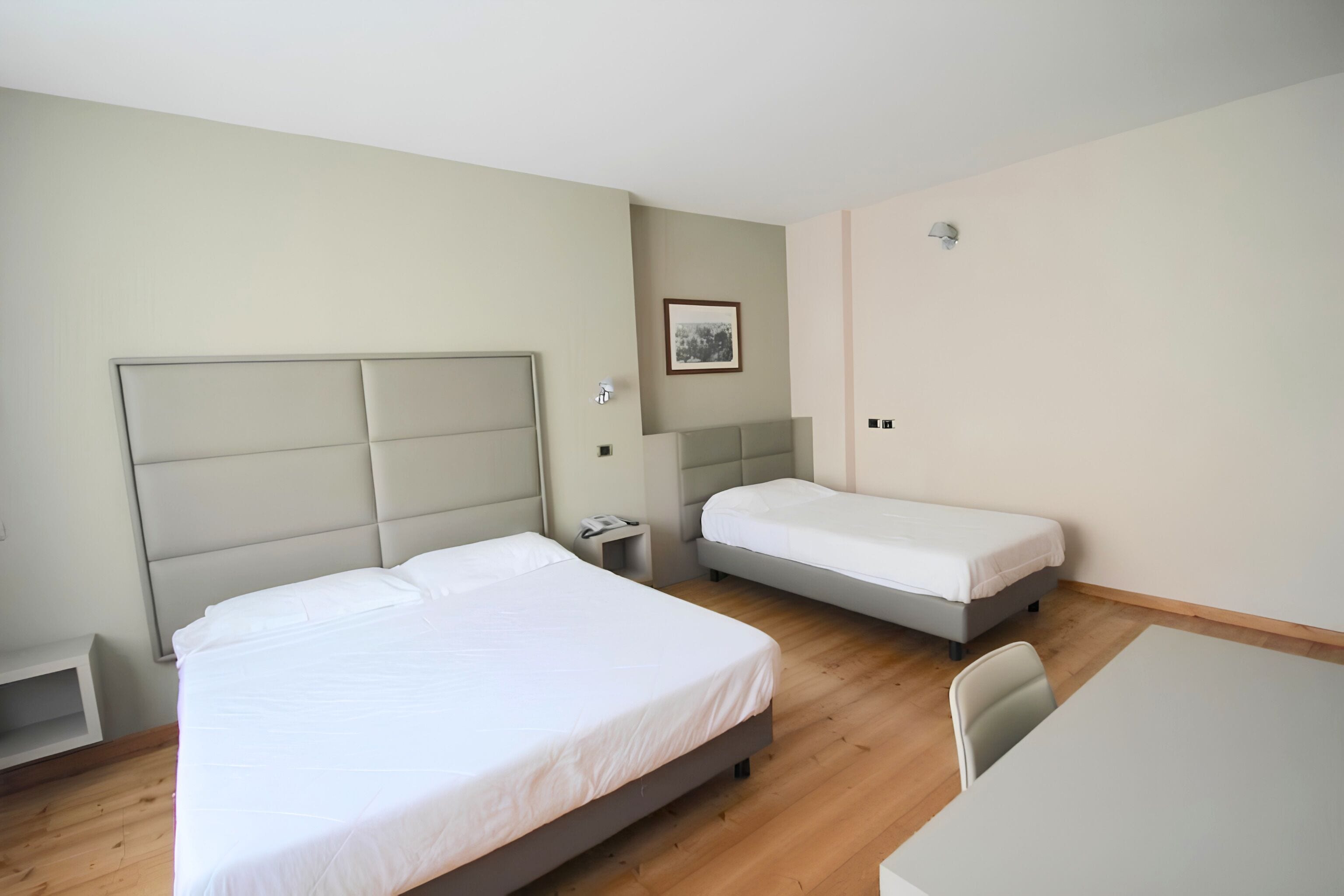 Triple Room | Minibar, in-room safe, desk, soundproofing
