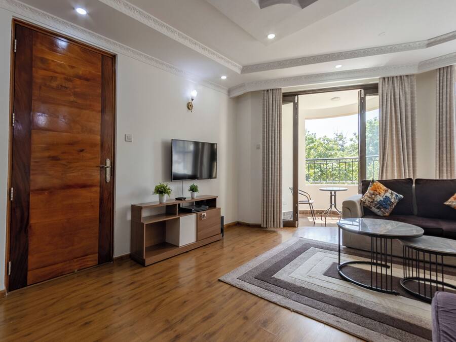 Appartement Familial, 4 chambres, vue jardin | Restauration dans la chambre