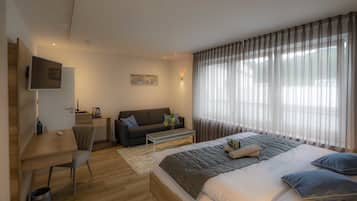 Deluxe suite, privébadkamer | 1 slaapkamer, beddengoed