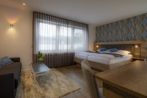 Suite Deluxe, bany privat | 1 dormitori i roba de llit 