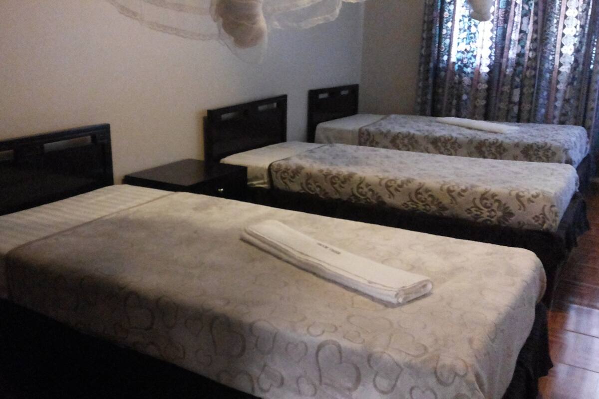 Premium bedding, desk, blackout drapes, soundproofing