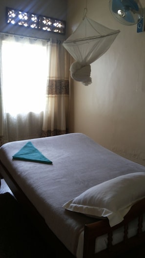 Single Room | Premium bedding, individually decorated, desk, blackout drapes - Enro Hotel (Mityana)