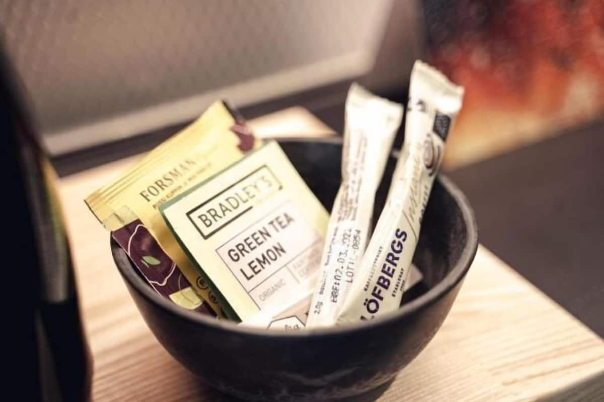 A bowl containing tea bags.