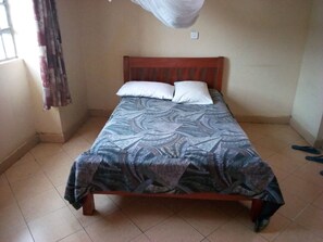Single Room | Bed sheets - Chartered Guest House (Ruiru)