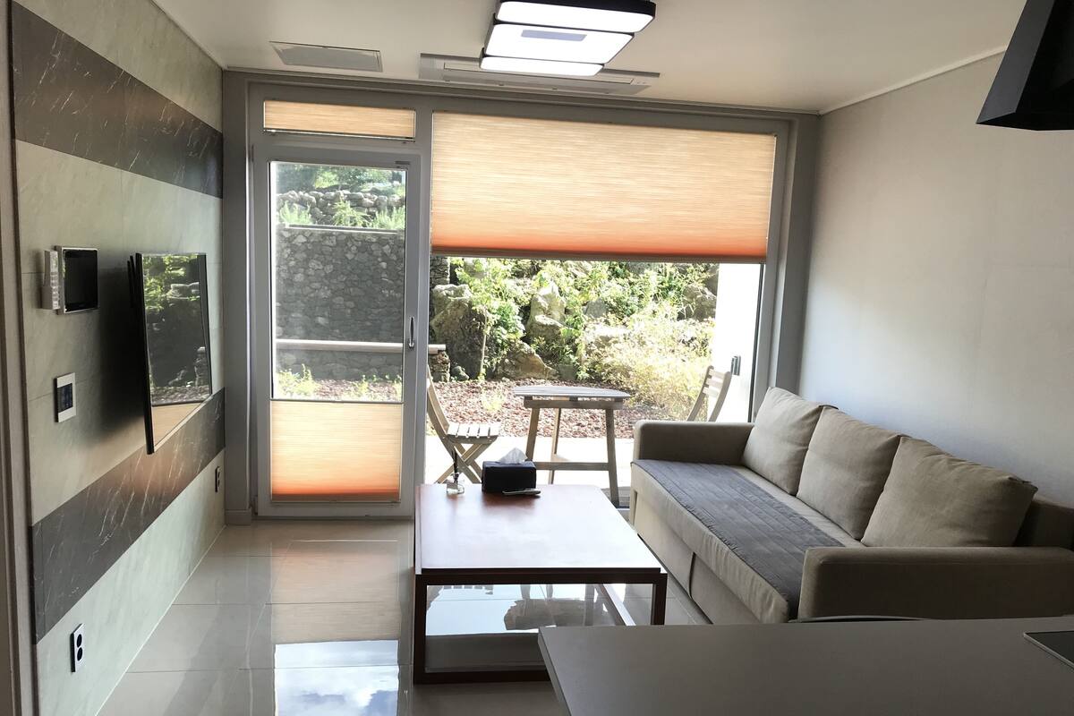 Terraced resort pension with basaltic garden | View from room