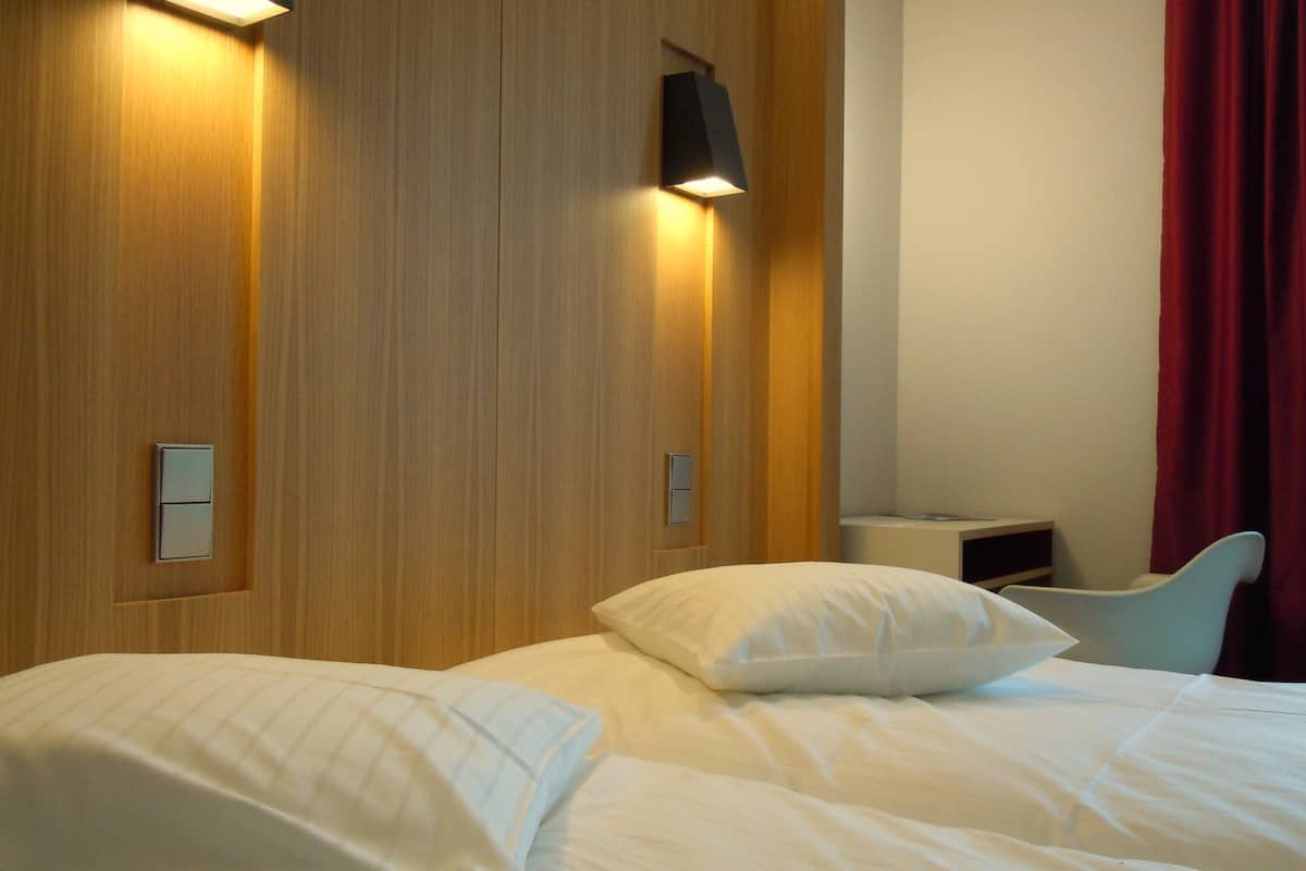 Blackout drapes, soundproofing, free cribs/infant beds, free WiFi
