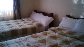 3 bedrooms, premium bedding, memory-foam beds, desk