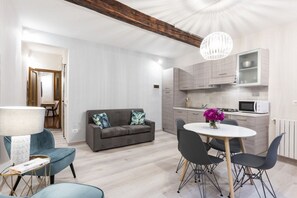 Apartment, 2 Bedrooms | Living area | Flat-screen TV