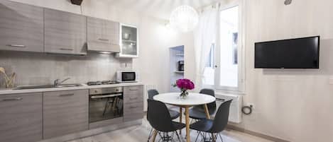 Apartment, 2 Bedrooms | Living area | Flat-screen TV