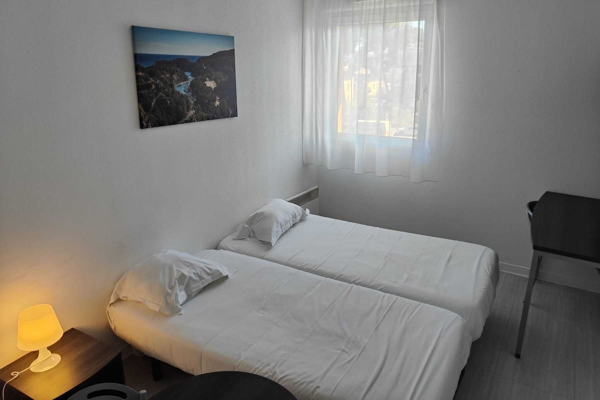 Classic Studio | Desk, blackout drapes, soundproofing, iron/ironing board