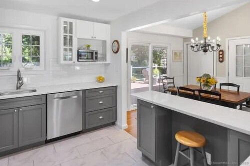 Great family home, fenced in back yard and Weber grill.