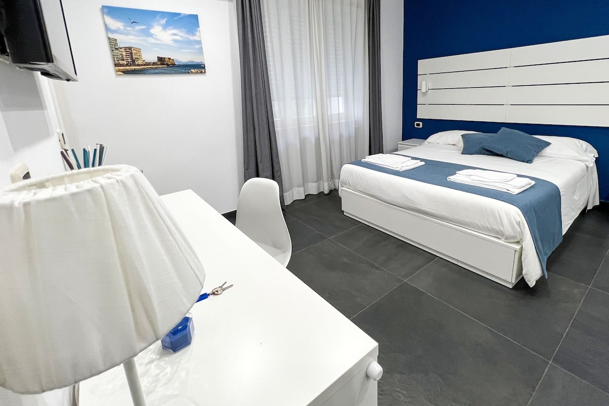 Comfort Double Room (Blue) | Down comforters, pillowtop beds, desk, laptop workspace