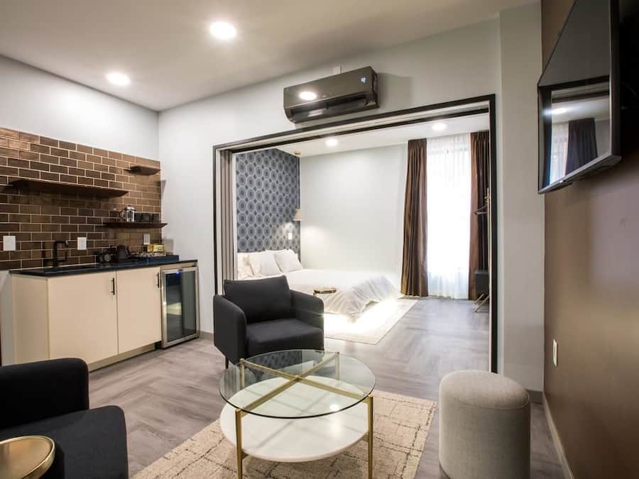 New Money King Suite Main St View | Living area | 40-inch LED TV with satellite channels, TV