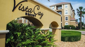 A yellow archway with the text "Vista Cay Resort" indicating the name of the hotel. - Stylish and Contemporary Vista Cay Hideaway - Lake View 3bd/2ba #3vc4126 (Orlando)