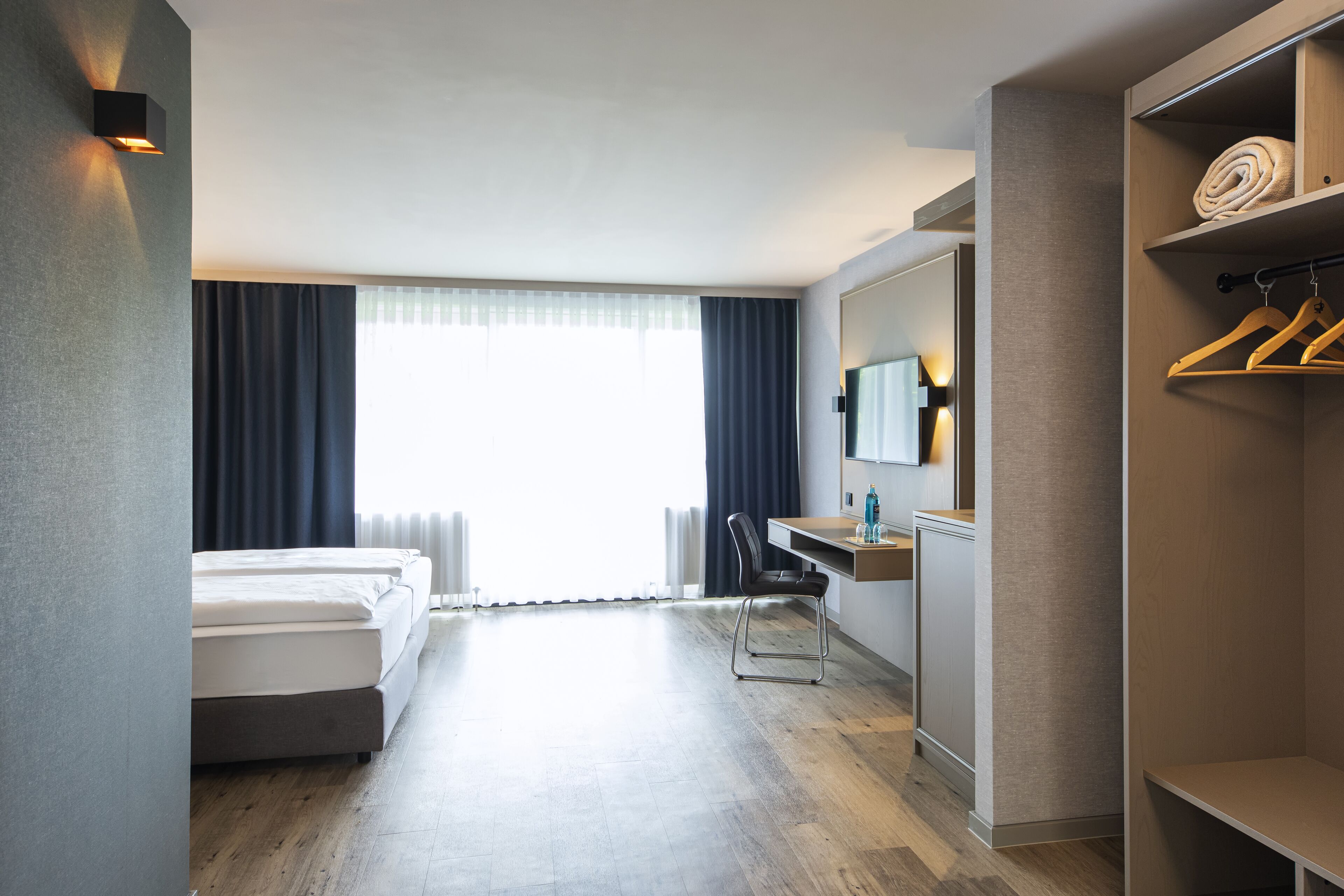 Comfort kamer (Doppelzimmer) | Een bureau, een laptopwerkplek, verduisterende gordijnen, gratis wifi