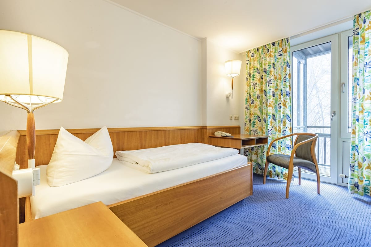 Desk, laptop workspace, blackout curtains, free WiFi