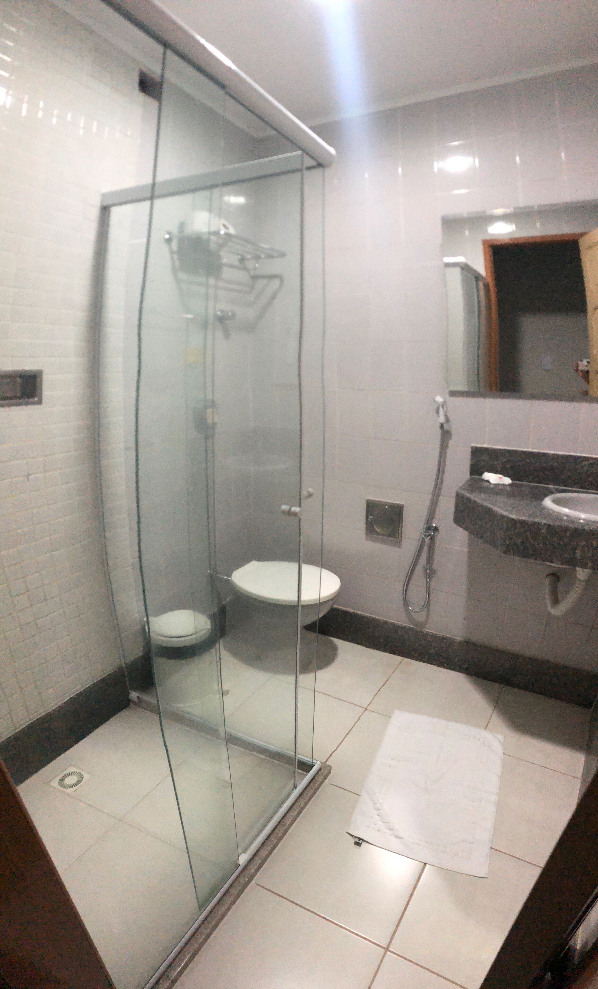 standard room | bathroom | shower, hair dryer, towels, toilet paper