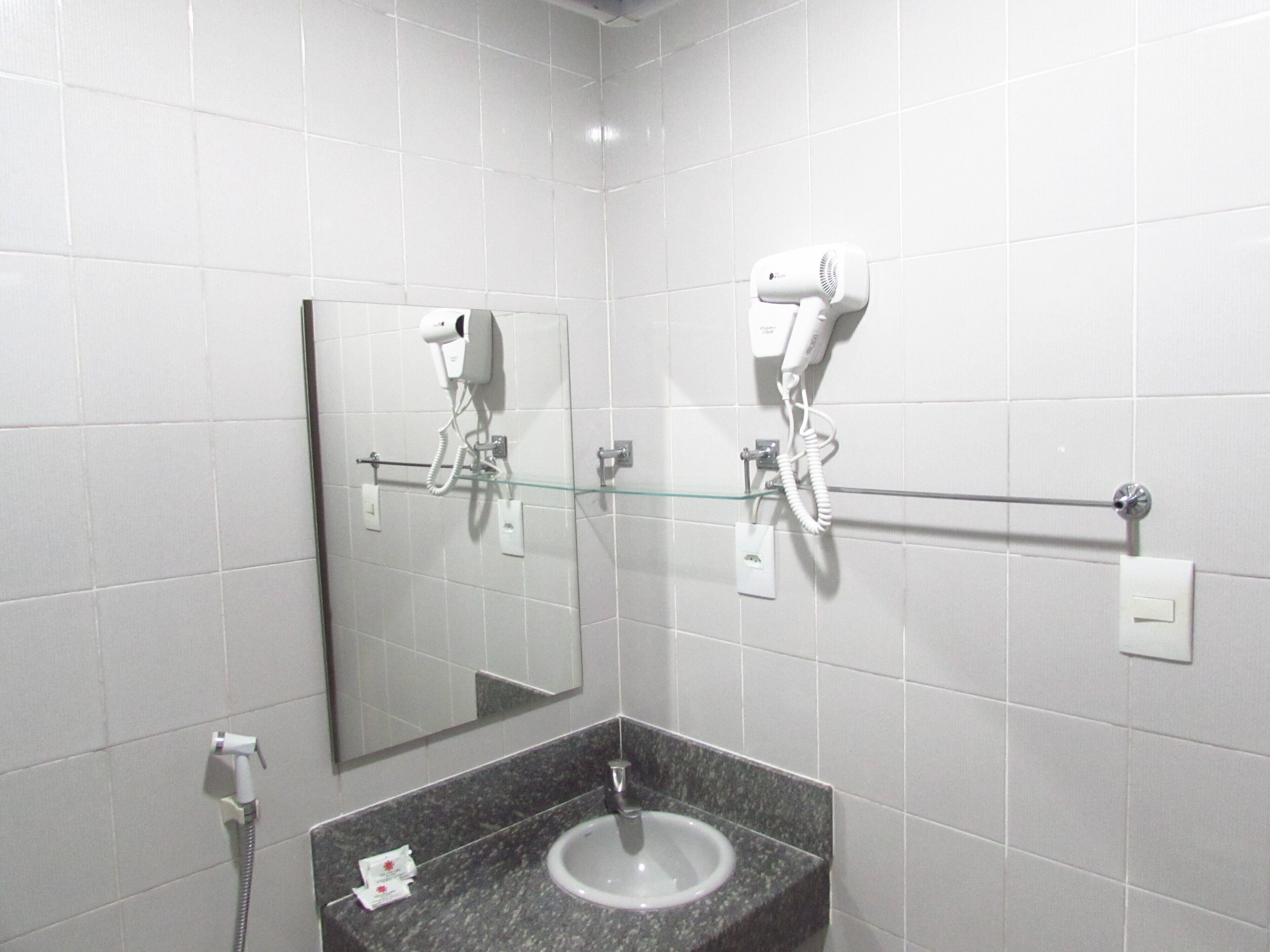 standard room | bathroom | shower, hair dryer, towels, toilet paper