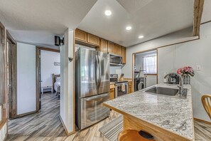 Fridge, microwave, stovetop, cookware/dishes/utensils