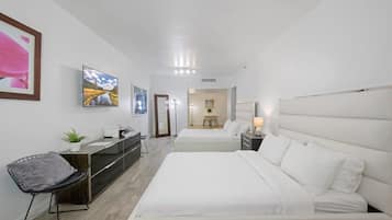 Tabla de planchar con plancha, wifi gratis y ropa de cama