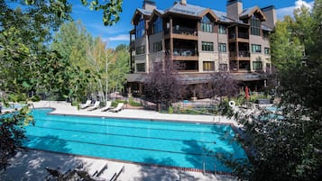 Outdoor pool, pool umbrellas, sun loungers