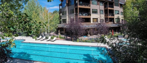 Outdoor pool, pool umbrellas, sun loungers