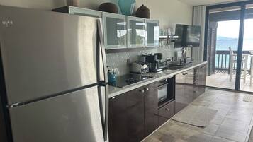 Coffee/tea maker, fridge, microwave, oven