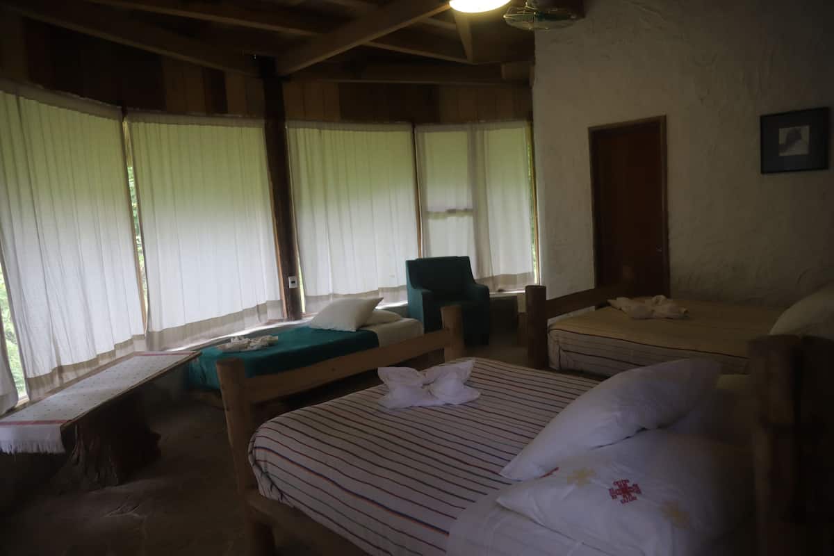 Family Room | Desk, blackout curtains, iron/ironing board, bed sheets