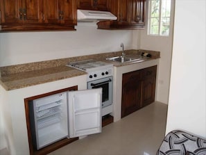 Condo, 2 Bedrooms | Private kitchenette | Fridge, cookware/dishes/utensils - Spurlock Residences (Lapu-Lapu)