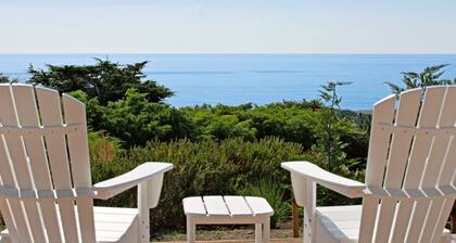 Luxurious, new coastal home w/modern kitchen, sweeping ocean and pastoral views