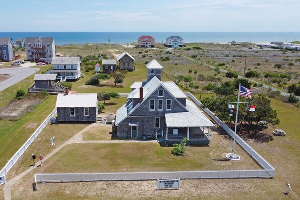 Explore the rich history of the Chicamacomico Life-Saving Station, a portrait of the Outer Banks' can-do spirit. - Oceanview Home in Salvo with Hot Tub, Game Room, Grill, Beach Nearby (Salvo)