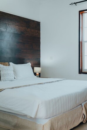 Deluxe Suite, 1 Bedroom, Partial Ocean View | Premium bedding, in-room safe, desk, laptop workspace - Harmony Resort Boutique Hotel (Brufut)