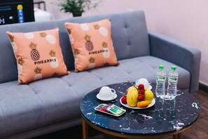 Junior Double Room | Living area | 40-inch Smart TV with cable channels, TV