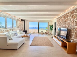 Smart TV, fireplace, DVD player, foosball