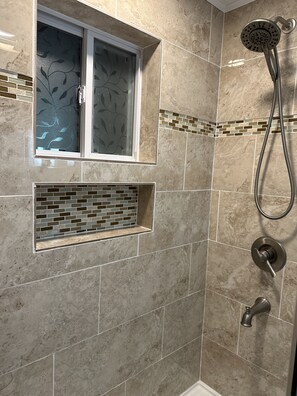 Combined shower/tub, hair dryer, towels, soap