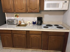 Fridge, microwave, stovetop, coffee/tea maker - Cozy Studio University Area walking distance to convention center. (Phoenix)
